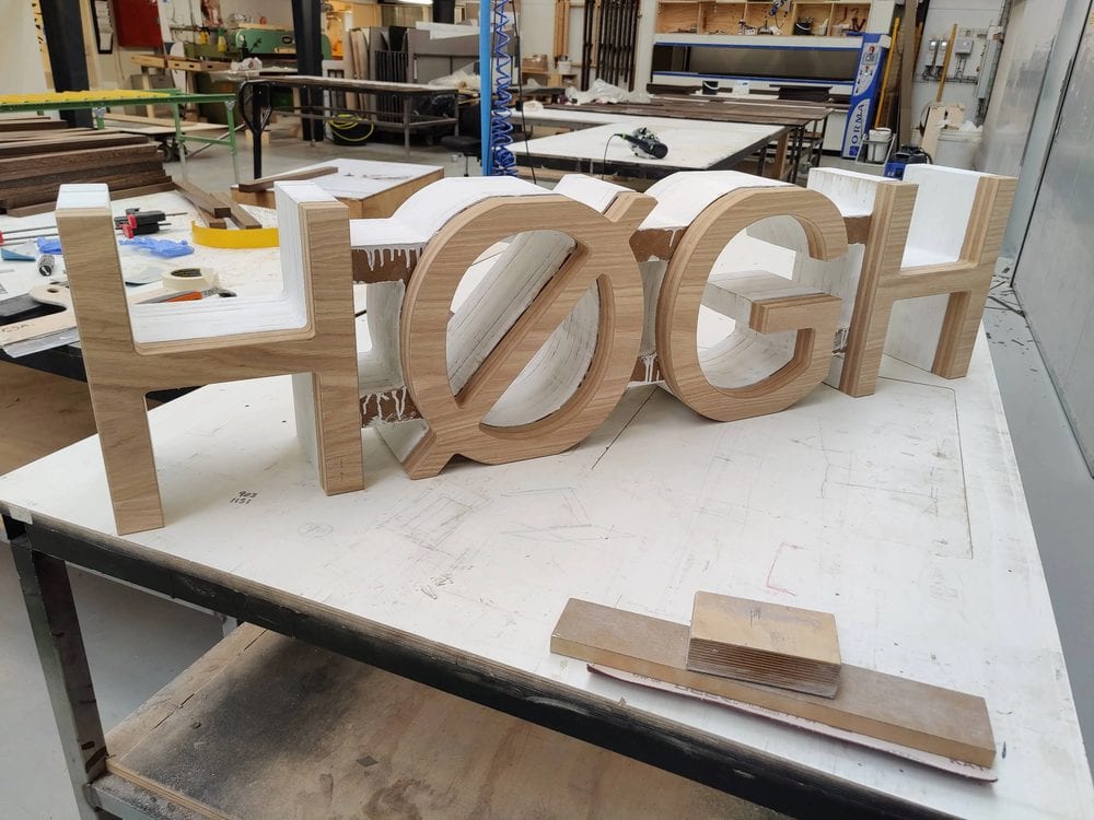 CNC oak letters in workshop